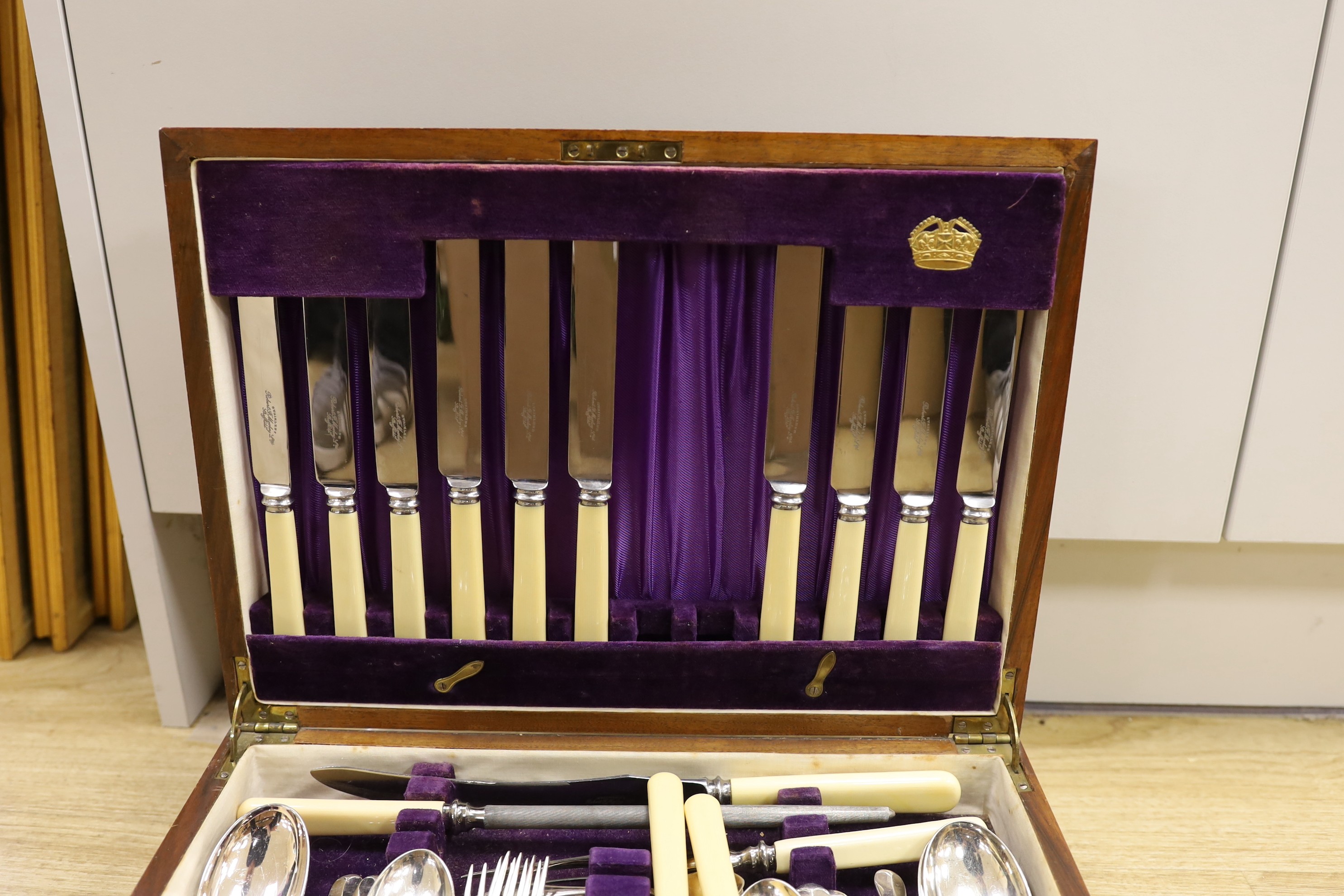 A cased plated canteen of cutlery